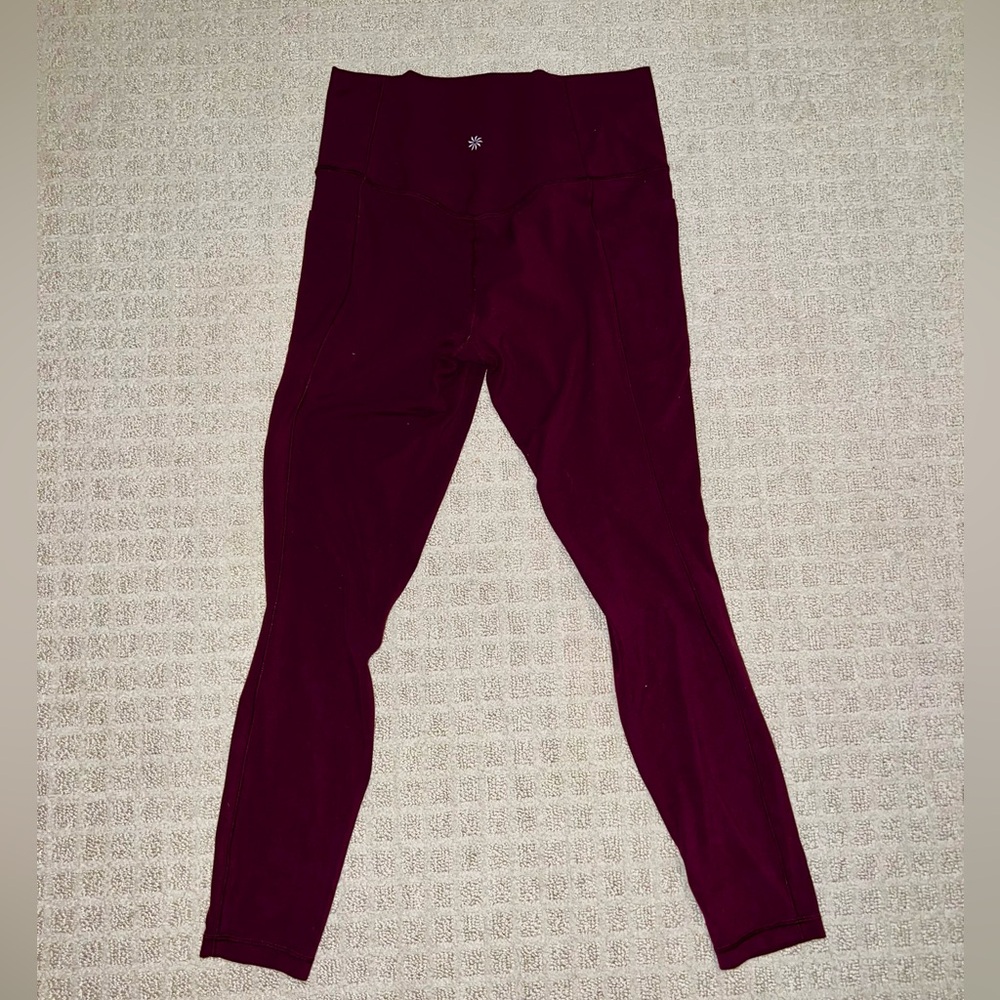 COPY - GUC Athleta salutation stash tight with pockets